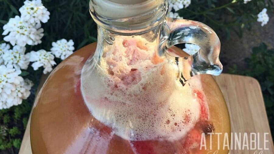 strawberry mead in a glass bottle